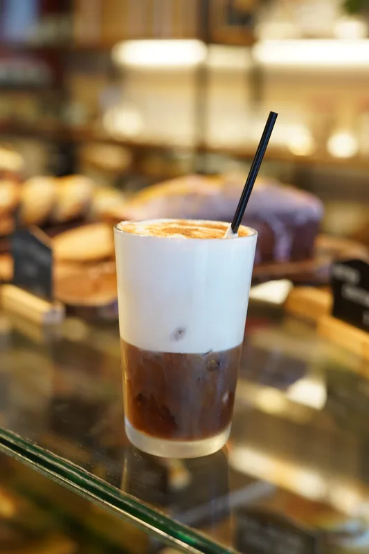 Layered freddo coffee served over ice